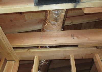 Restricted ductwork found before the ceiling was installed at this construction inspection